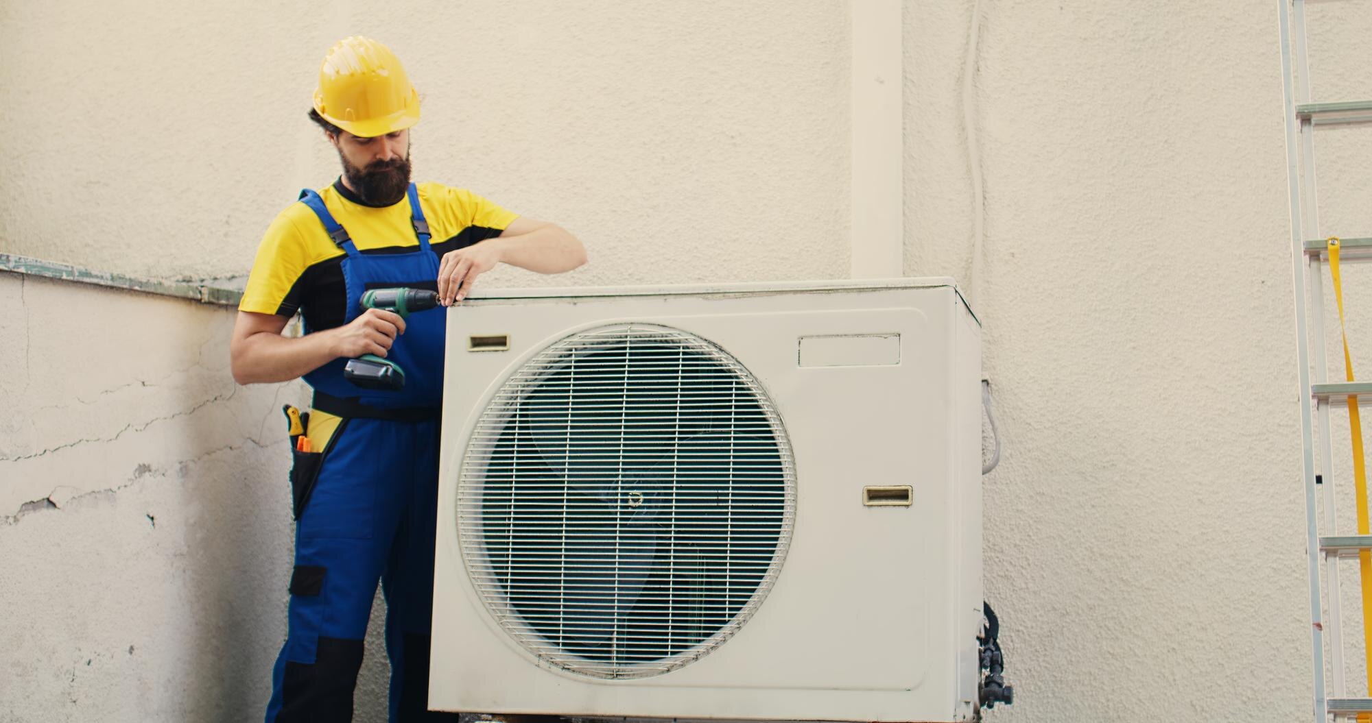 Bayer Heating and Cooling technician providing AC repair in Carbondale, IL