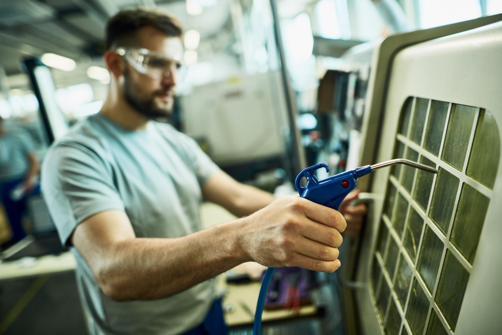 HVAC technician inspecting equipment