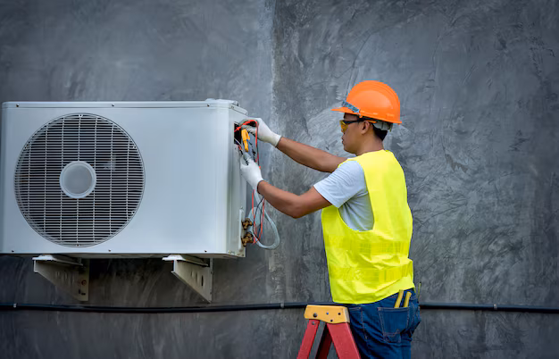 Bayer Heating and Cooling technician providing heating and cooling in Carterville, IL